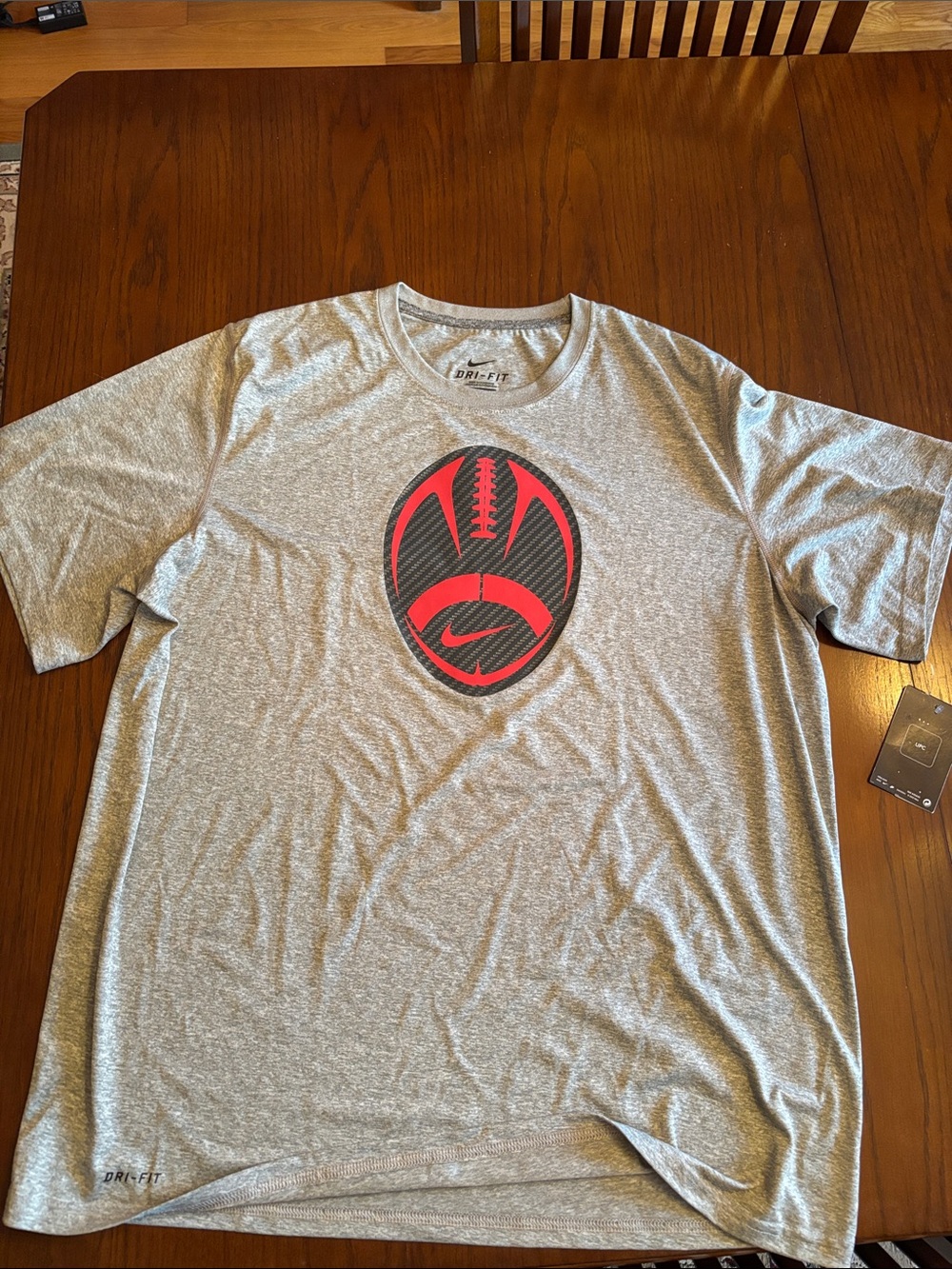 Nike Gray Short Sleeve Dri-FIT Tee with Red Football Logo